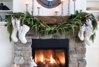 Gorgoeus rustic stone fireplace with christmas décor 34