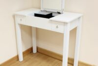 Makeup vanity table with fold down mirror