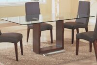 Glass dining table with wooden legs