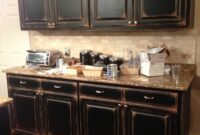 Distressed black kitchen cabinets