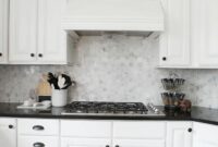 Backsplash for white cabinets and black countertops