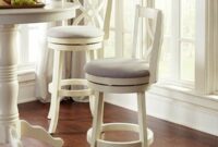 White swivel bar stools